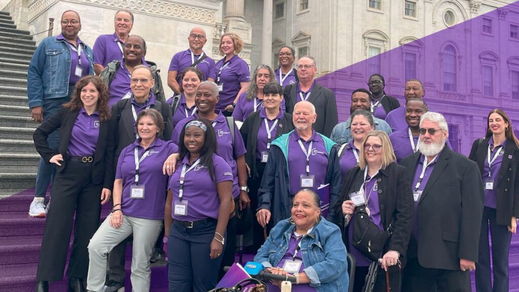 Group of PAN staff, advocates, and patients stand in front of US capitol